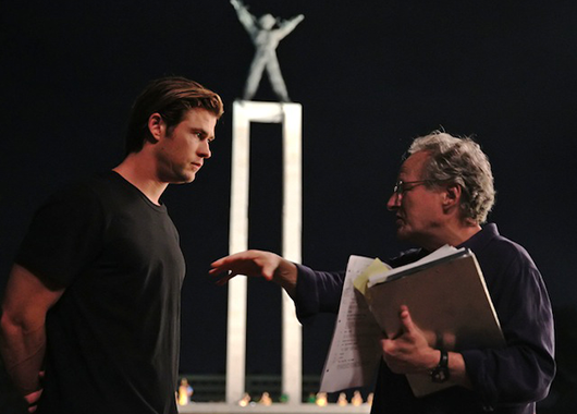 Chris Hemsworth being directed by Michael Mann on the set of "Blackhat" (Source: Indiewire)