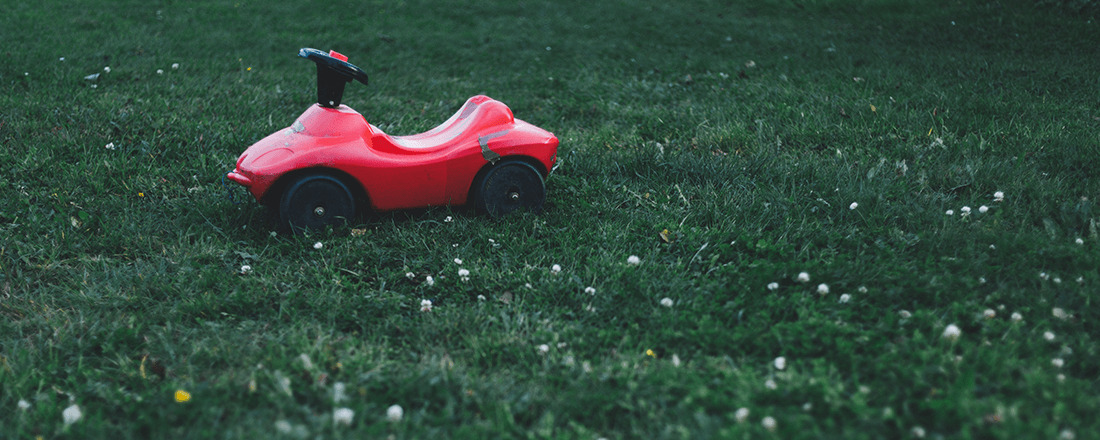 Toy Car on Lawn