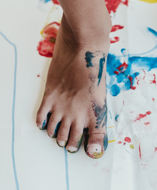 Boy's Feet with Paint